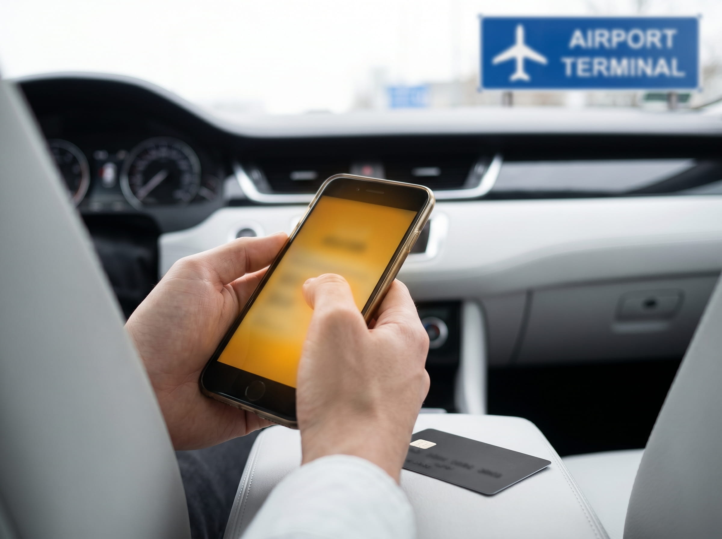 Booking a UK taxi online by card with instant quote on smartphone